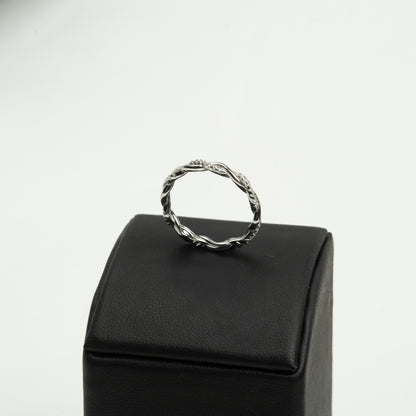 “Twisted” ring